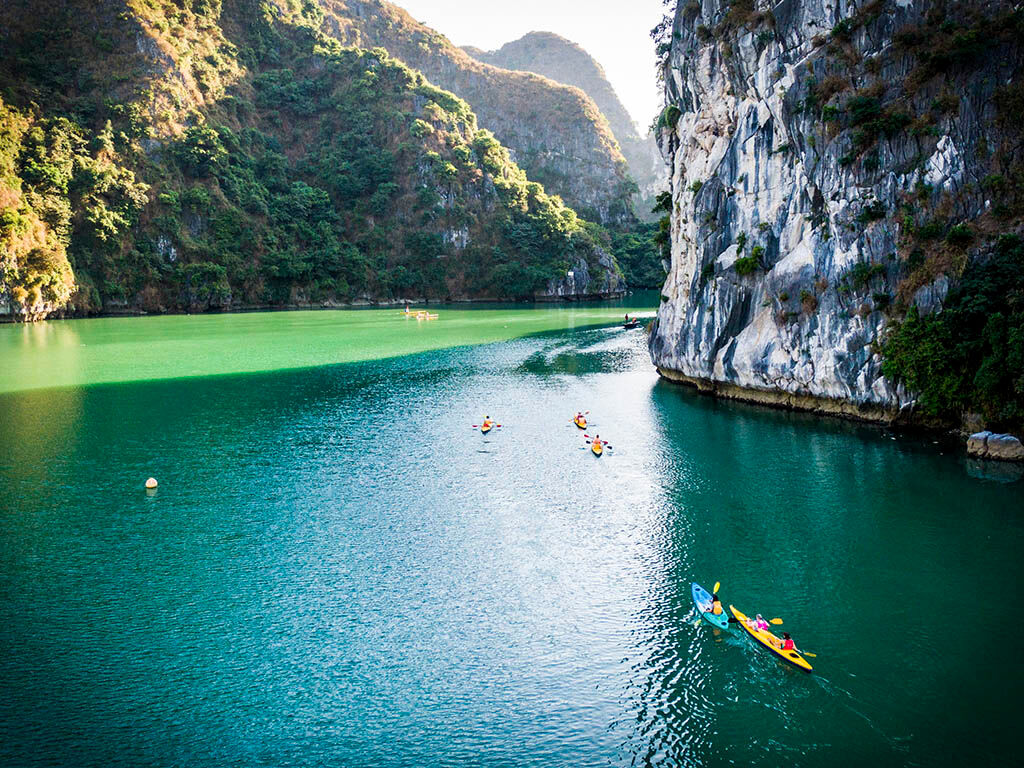 Paddle through emerald lagoons
